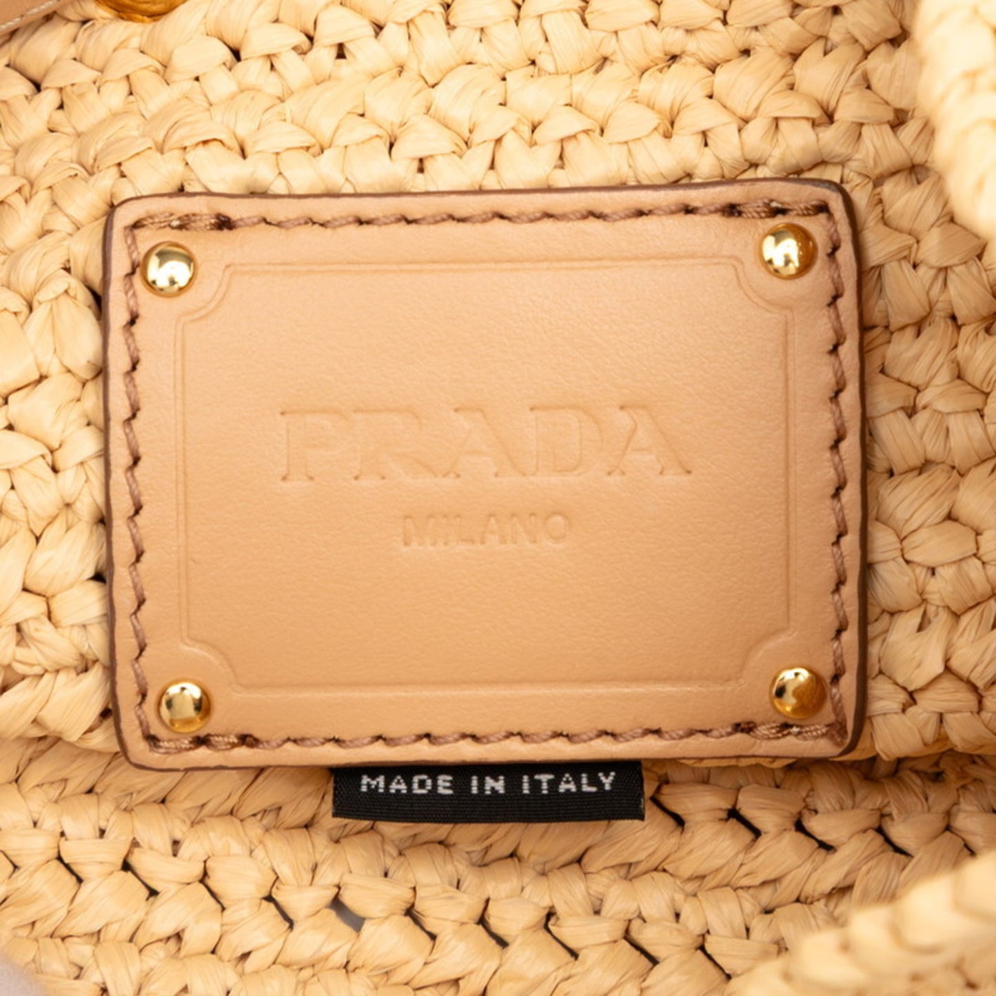 Prada Triangle Logo Plate Bucket Bag