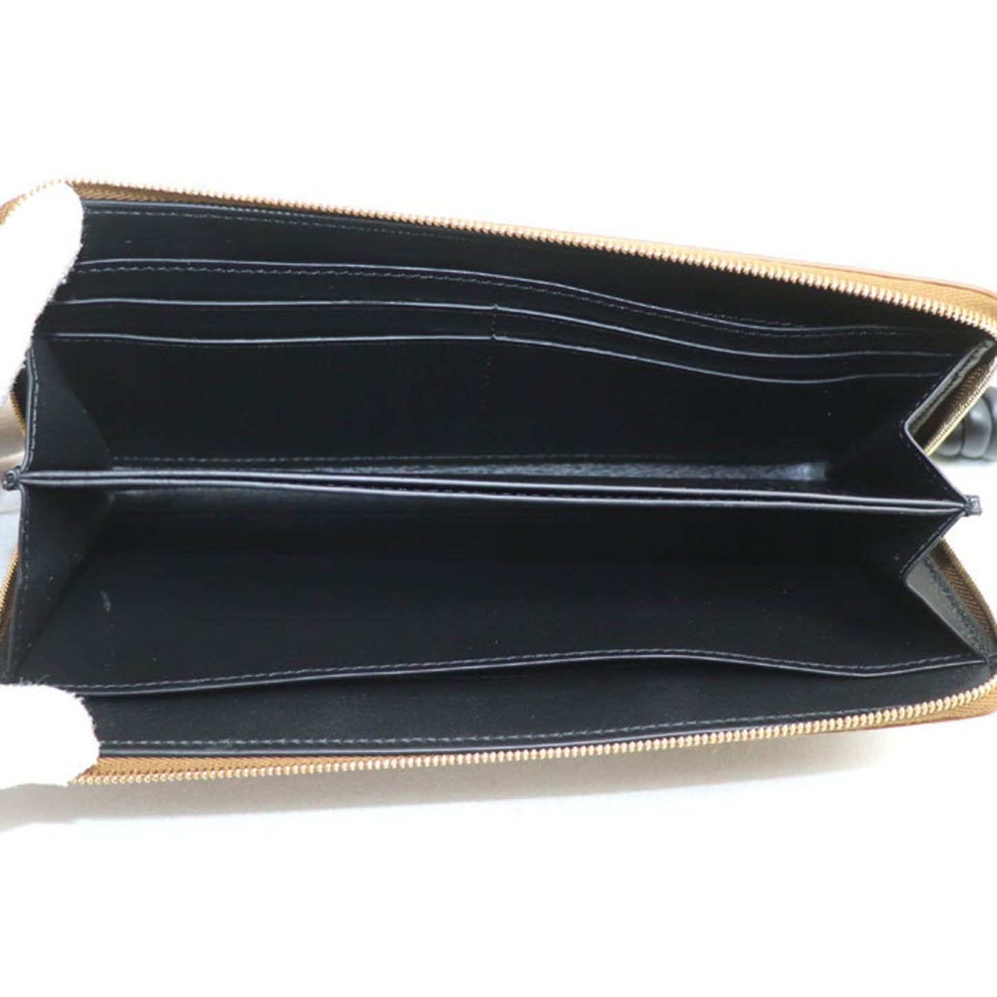 Loewe Knot Zip Around Wallet Long Round Brown Cem1G39X01