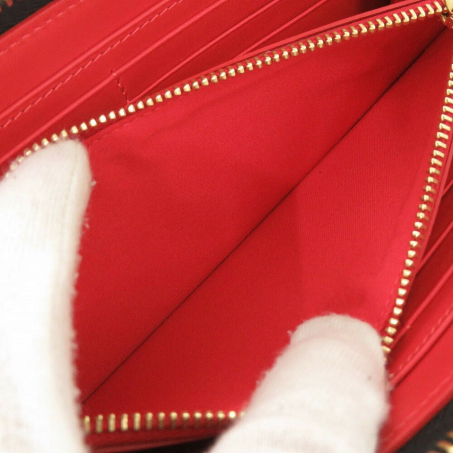 Like New Christian Louboutin Panettone Leather Round Long Wallet In Black And Gold