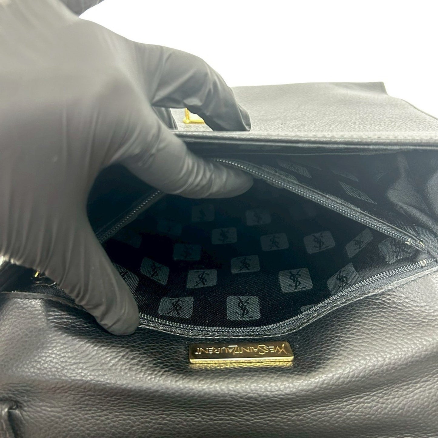 Yves Saint Laurent Ysl Logo Cutout Perforated Leather Handbag In Black