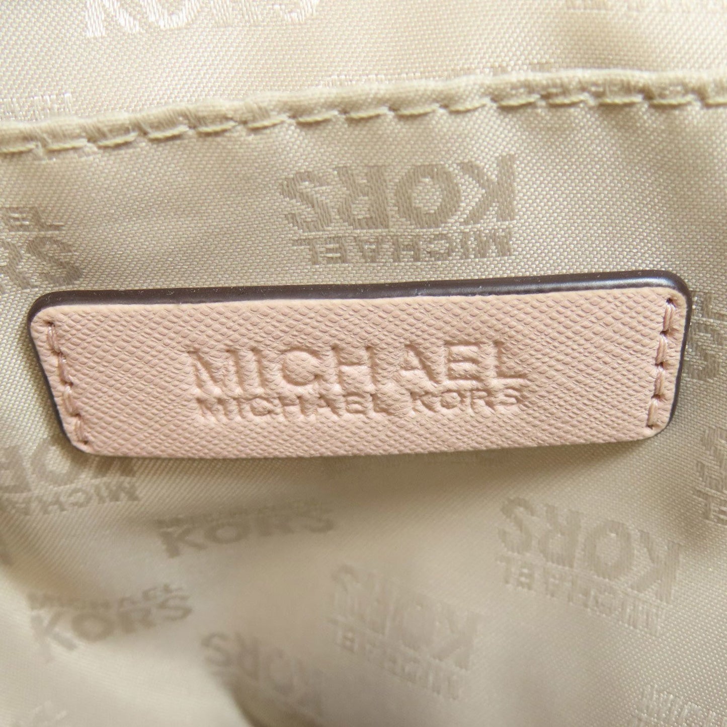 Michael Kors Perforated Backpacks