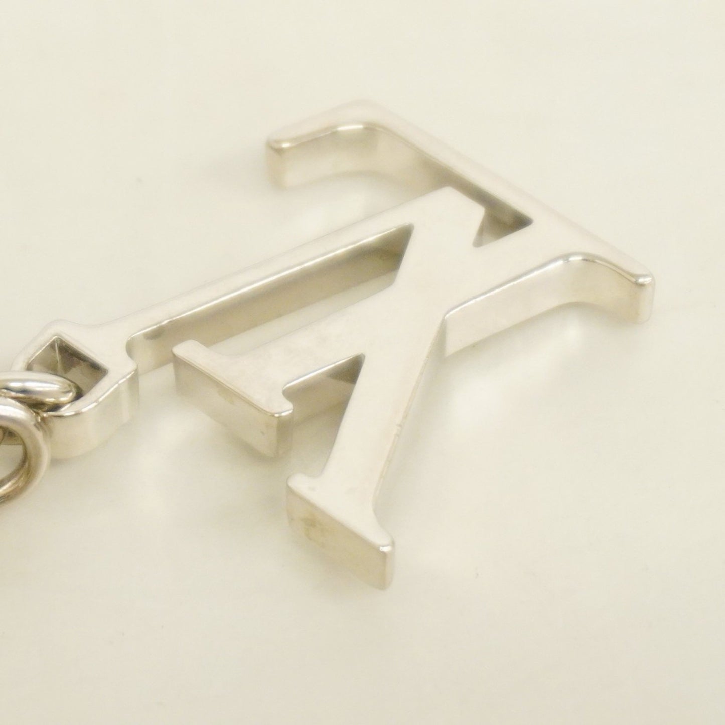 Louis Vuitton Limy Keychain M67935 Beige Silver
