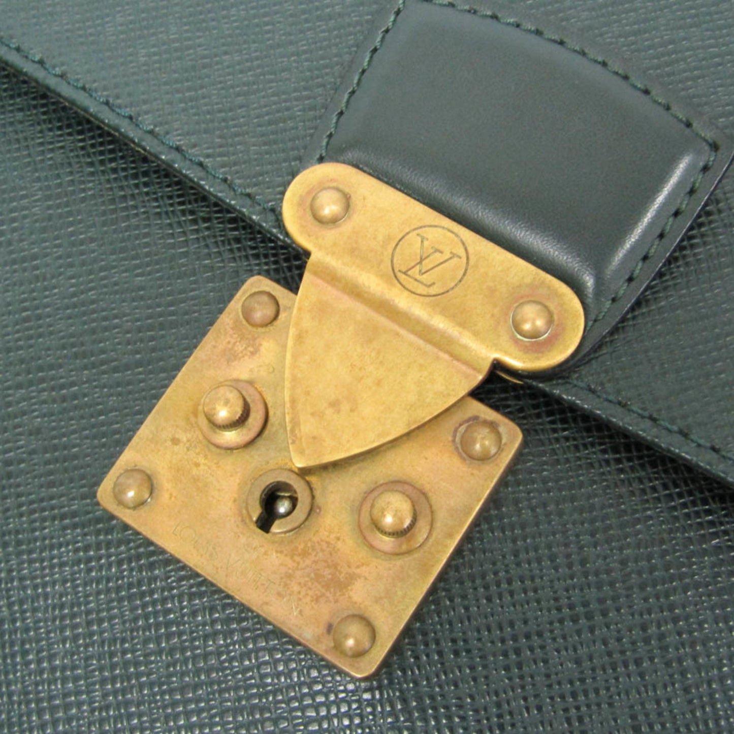 Louis Vuitton Taiga Serviette Kourad M30074