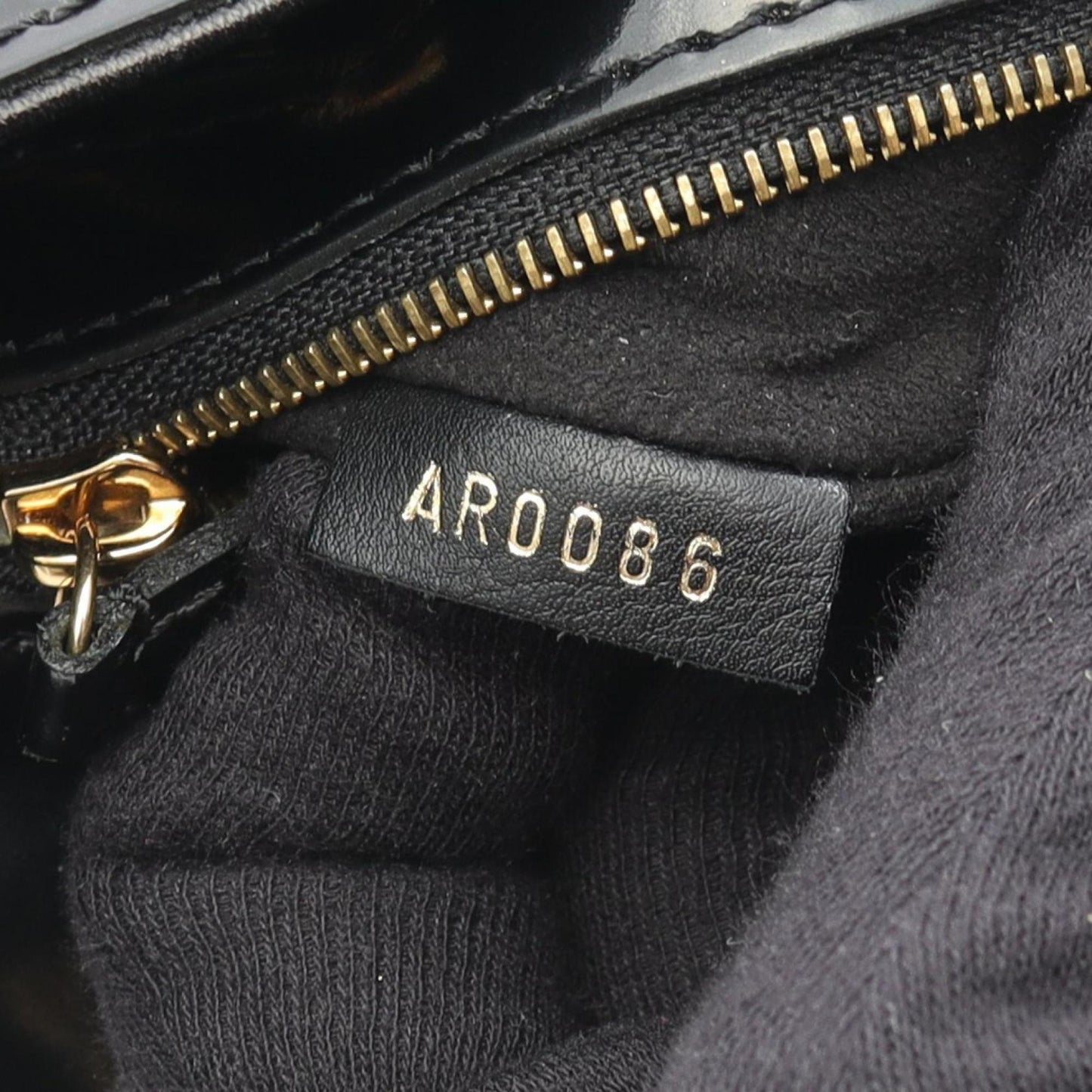 Louis Vuitton Bolly Shoulder Bag In Patent Leather With Monogram Embossing