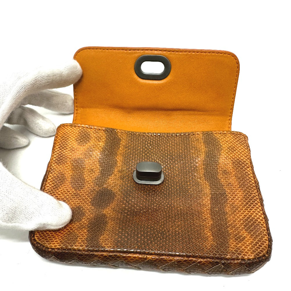 Bottegaveneta Pouch Leather Orange Embossed Turn Lock Women