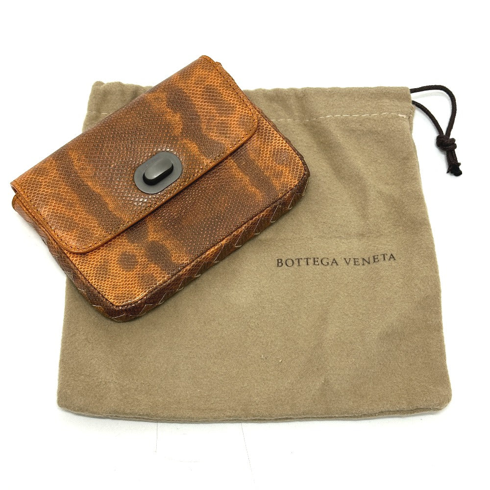 Bottegaveneta Pouch Leather Orange Embossed Turn Lock Women