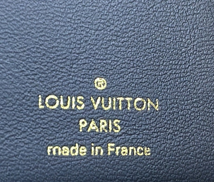 Louis Vuitton Lou Wallet Monogram Embossed Lambskin