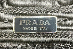 Prada Triangle Logo Zip Chain Crossbody Bag Embossed Leather Small