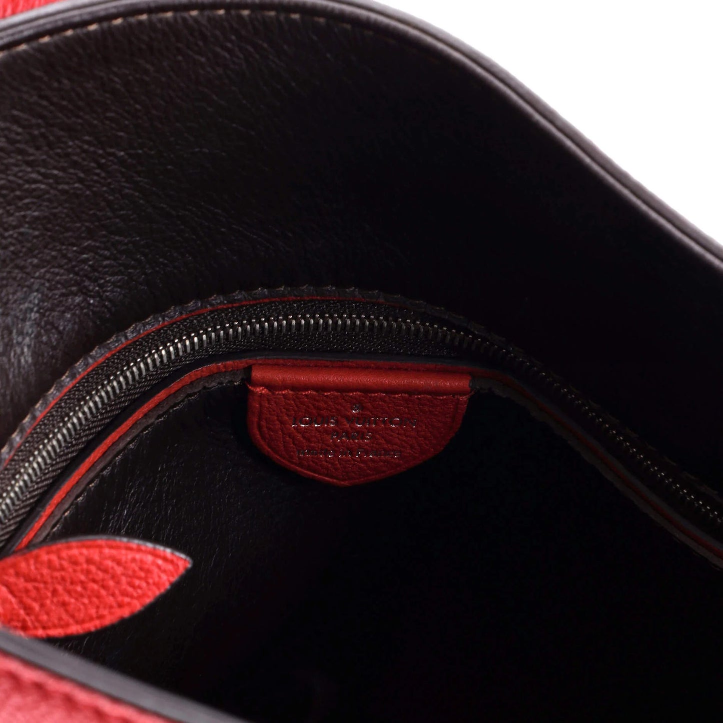 Louis Vuitton Tournon Handbag Leather