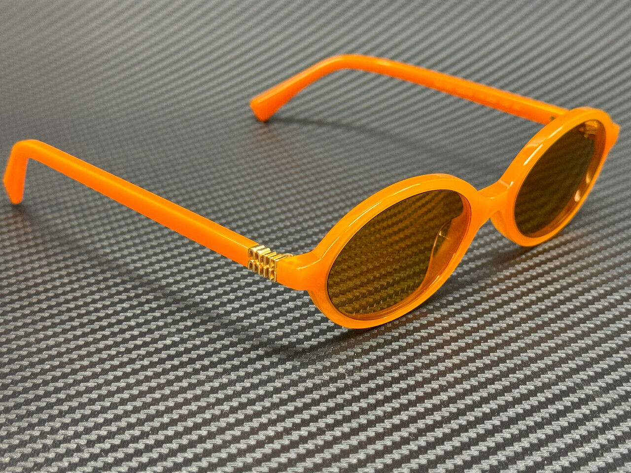MIU MIU MU 04ZS 11V40D Turmeric Opal Mirror