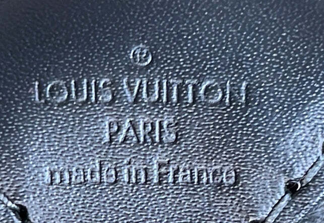 Louis Vuitton Horizon Clutch Monogram Taurillon Leather