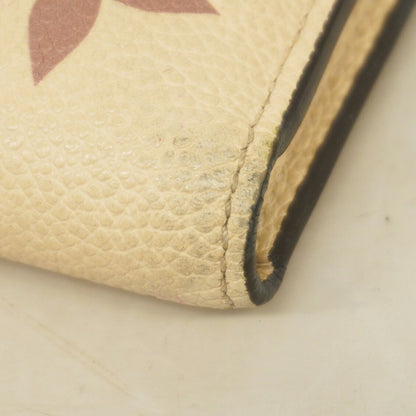 Louis Vuitton Monogram Empreinte Bicolor Tri-Fold Wallet Portefeuille Victorine M80086 Crme Bois De