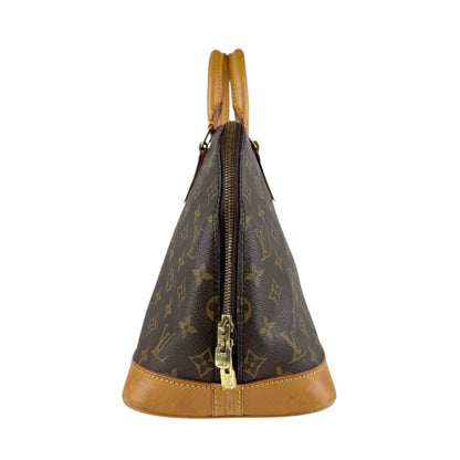 Louis Vuitton Monogram Alma Handbag In Canvas