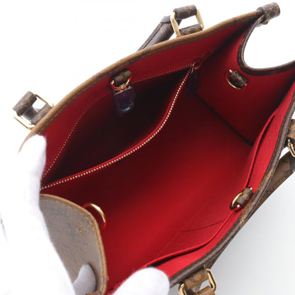 Louis Vuitton On The Go Pm Monogram Reverse Handbag Coated Canvas