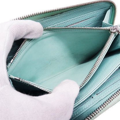 Louis Vuitton Monogram Empreinte Zippy Wallet In Vert D'Or Light Blue (M81466) From The Summer