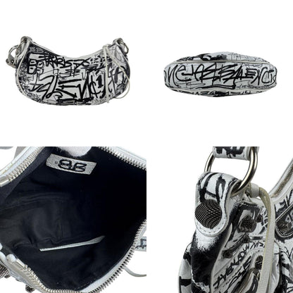 Balenciaga Le Cagole Xs Shoulder Bag In White And Black Leather