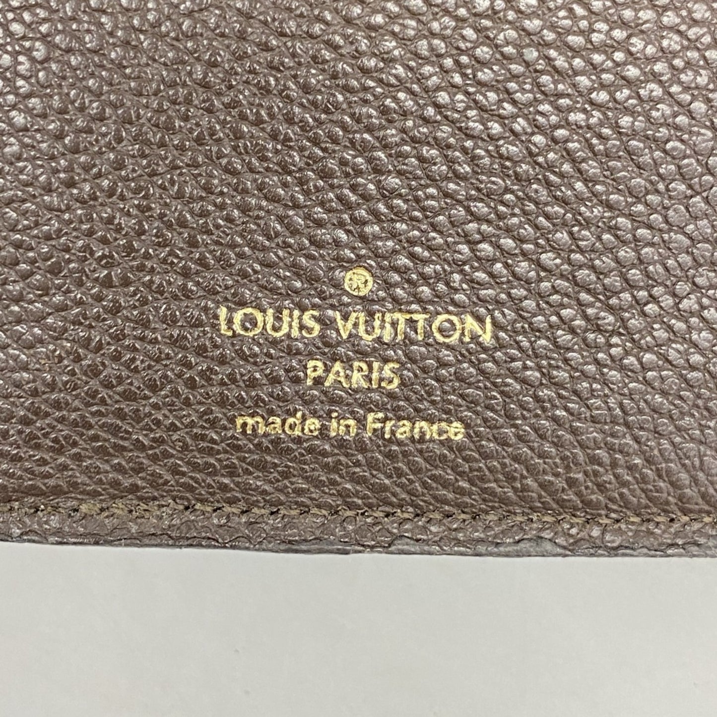 Louis Vuitton Monogram Empreinte Portefeuille Curieuse Tri-Fold Wallet M60543