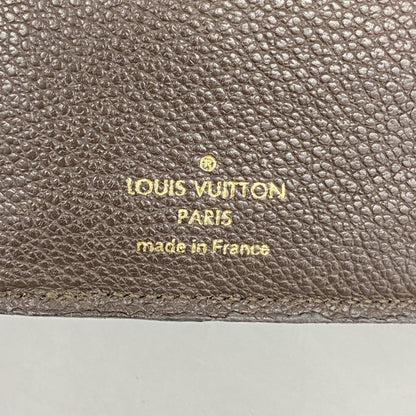 Louis Vuitton Monogram Empreinte Portefeuille Curieuse Tri-Fold Wallet M60543
