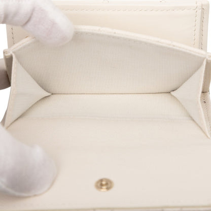 Chanel Matelasse Coco Mark Rhinestone Tri-Fold Wallet In White Caviar Leather