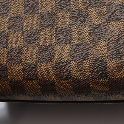 Louis Vuitton Triana Handbag