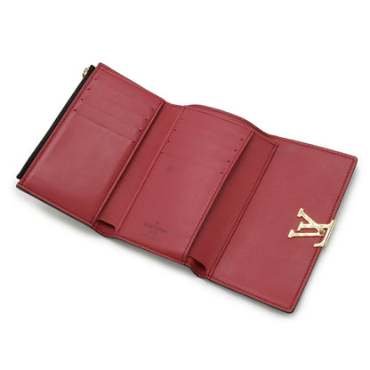 Louis Vuitton Portefeuille Capucines Compact Tri-Fold Wallet In Taurillon Leather Noir And Hot Pink