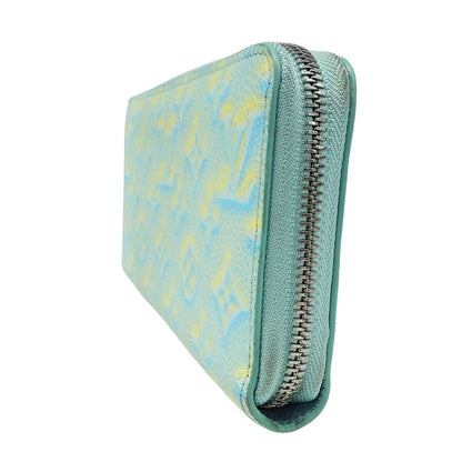 Louis Vuitton Monogram Empreinte Zippy Wallet In Vert D'Or Light Blue (M81466) From The Summer