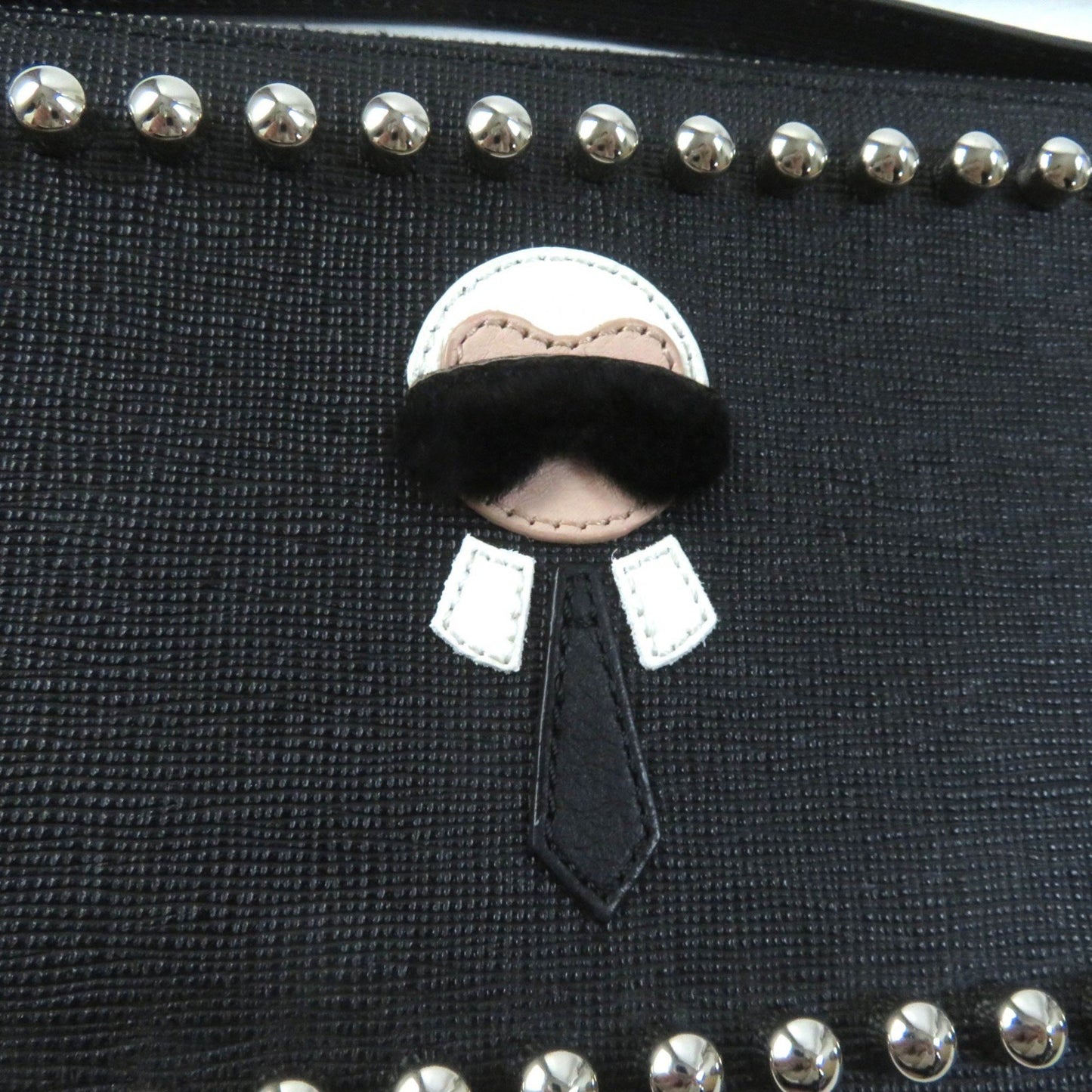 Fendi 8M0341 Karlito Karl Lagerfeld Motif Studded Leather Pouch In Black