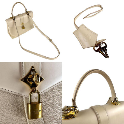 Louis Vuitton Rose Des Vents Pm Handbag Shoulder Bag In Light Beige And Gold