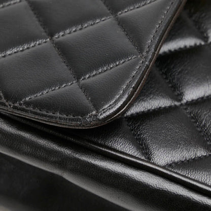 Chanel Matelasse Coco Mark Handbag In Black Lambskin