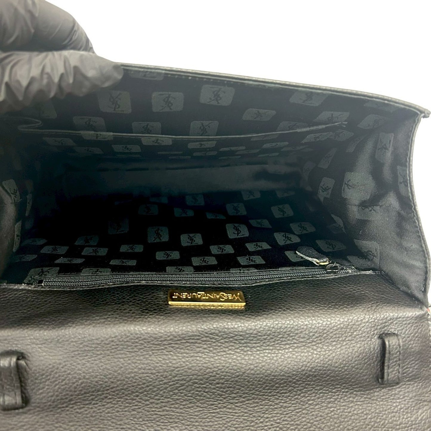 Yves Saint Laurent Ysl Logo Cutout Perforated Leather Handbag In Black