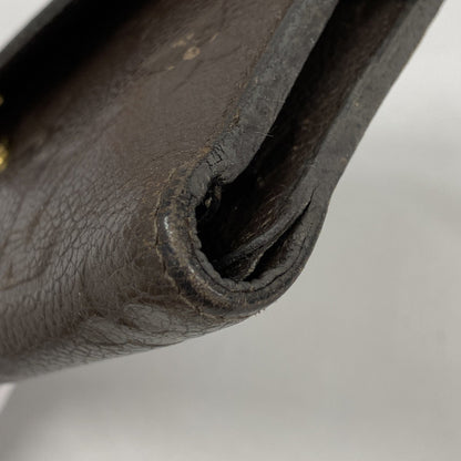 Louis Vuitton Monogram Empreinte Portefeuille Curieuse Tri-Fold Wallet M60543