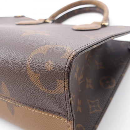 Louis Vuitton On The Go Pm Monogram Reverse Handbag Coated Canvas
