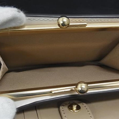 Coach Kisslock Medium Bifold Wallet C8724 In Beige Signature Canvas