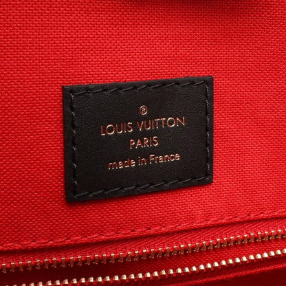 Louis Vuitton On The Go Mm Tote Bag In Coated Canvas And Leather With Monogram Giant Reverse Pattern