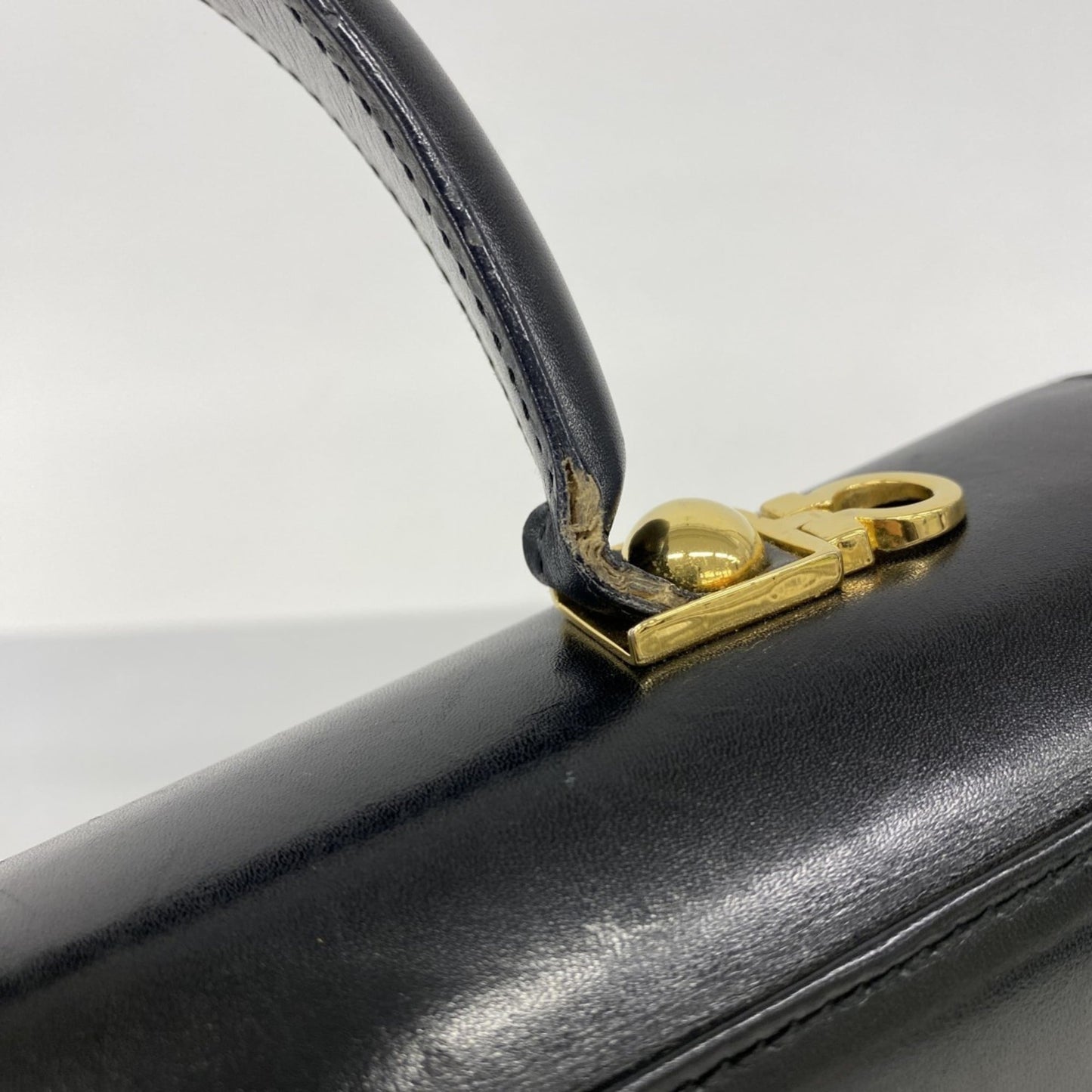 Salvatore Ferragamo Gancini Leather Handbag In Black