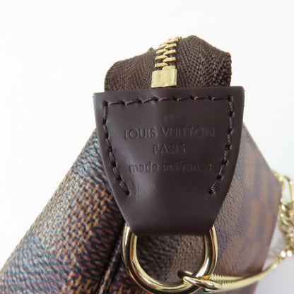 Louis Vuitton N58009 Mini Pochette Accessoires In Damier Ebene Brown
