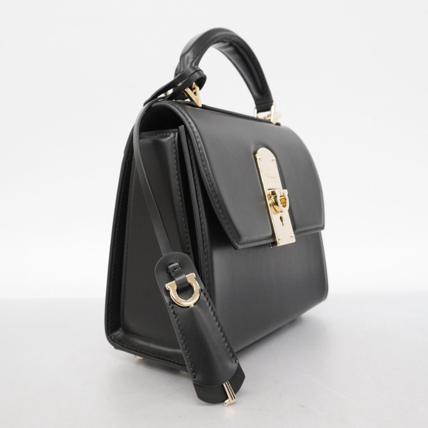 Salvatore Ferragamo Boxy Leather Handbag In Black And Champagne