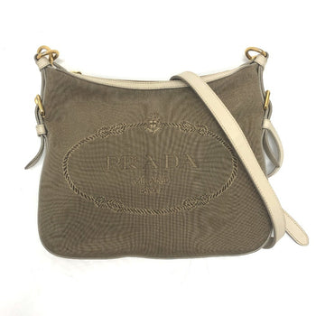 Prada Bt0706 Logo Jacquard Shoulder Bag In Canvas/Leather