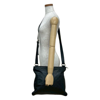 Gucci Gucci Shima Gg Logo Engraved Leather Shoulder Bag