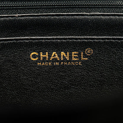 Chanel Matelasse Coco Mark Handbag In Black Caviar Skin