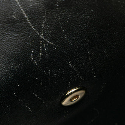 Chanel Matelasse Coco Mark Handbag In Black Caviar Skin