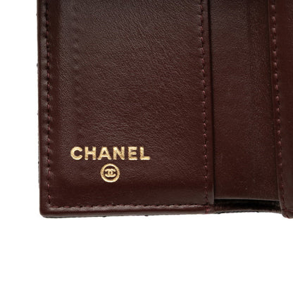 Chanel Matelasse Coco Mark Tri-Fold Wallet In Black With Gold Hardware And Caviar Leather