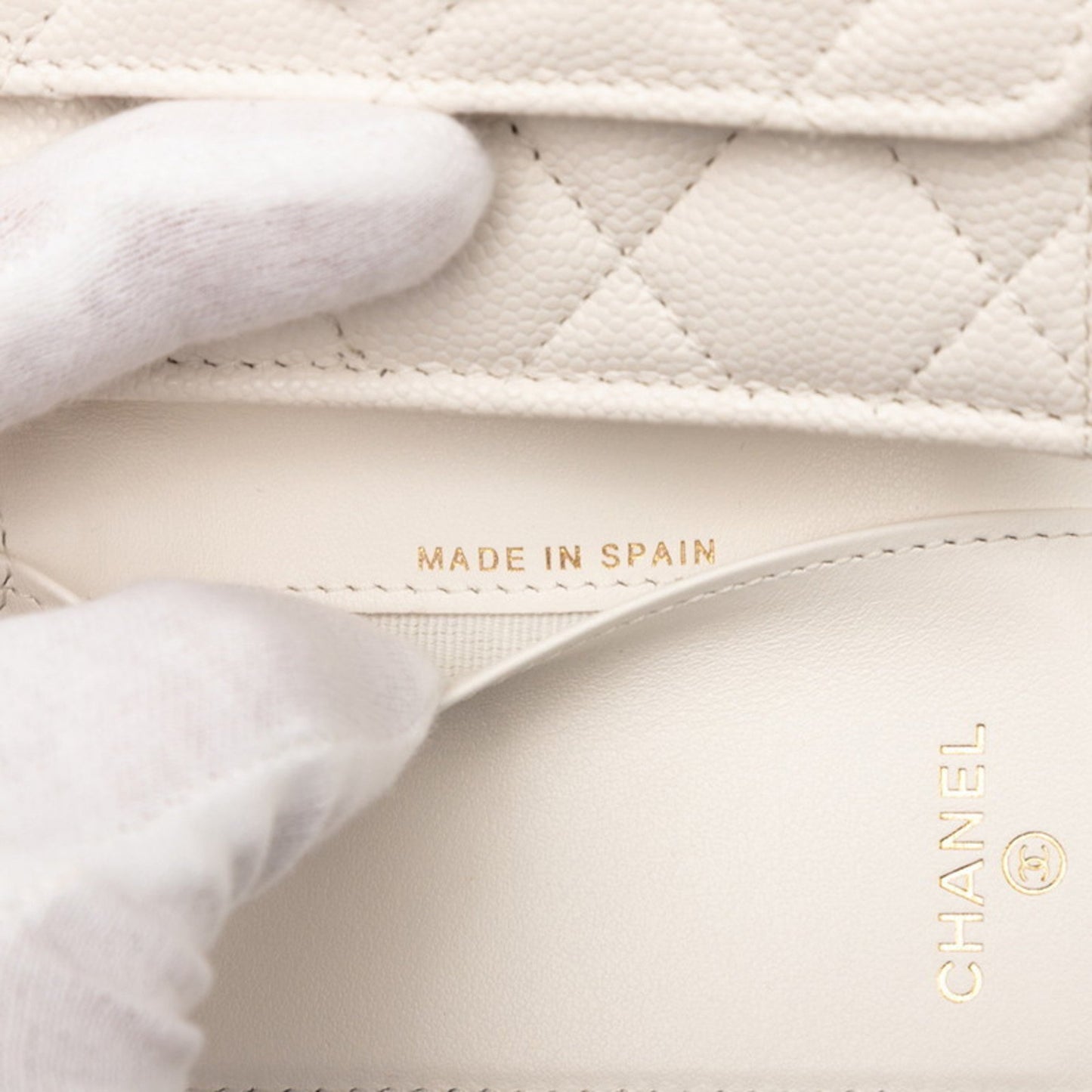 Chanel Matelasse Coco Mark Rhinestone Tri-Fold Wallet In White Caviar Leather