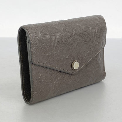 Louis Vuitton Monogram Empreinte Portefeuille Curieuse Tri-Fold Wallet M60543