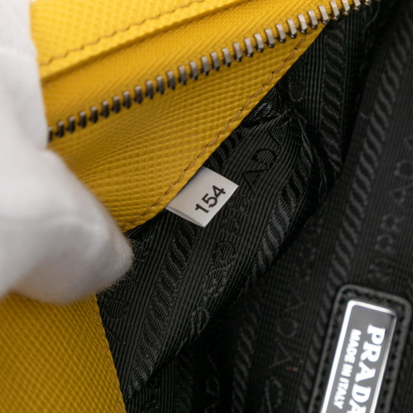 Prada Triangle Logo Plate Shoulder Bag In Yellow Saffiano Leather