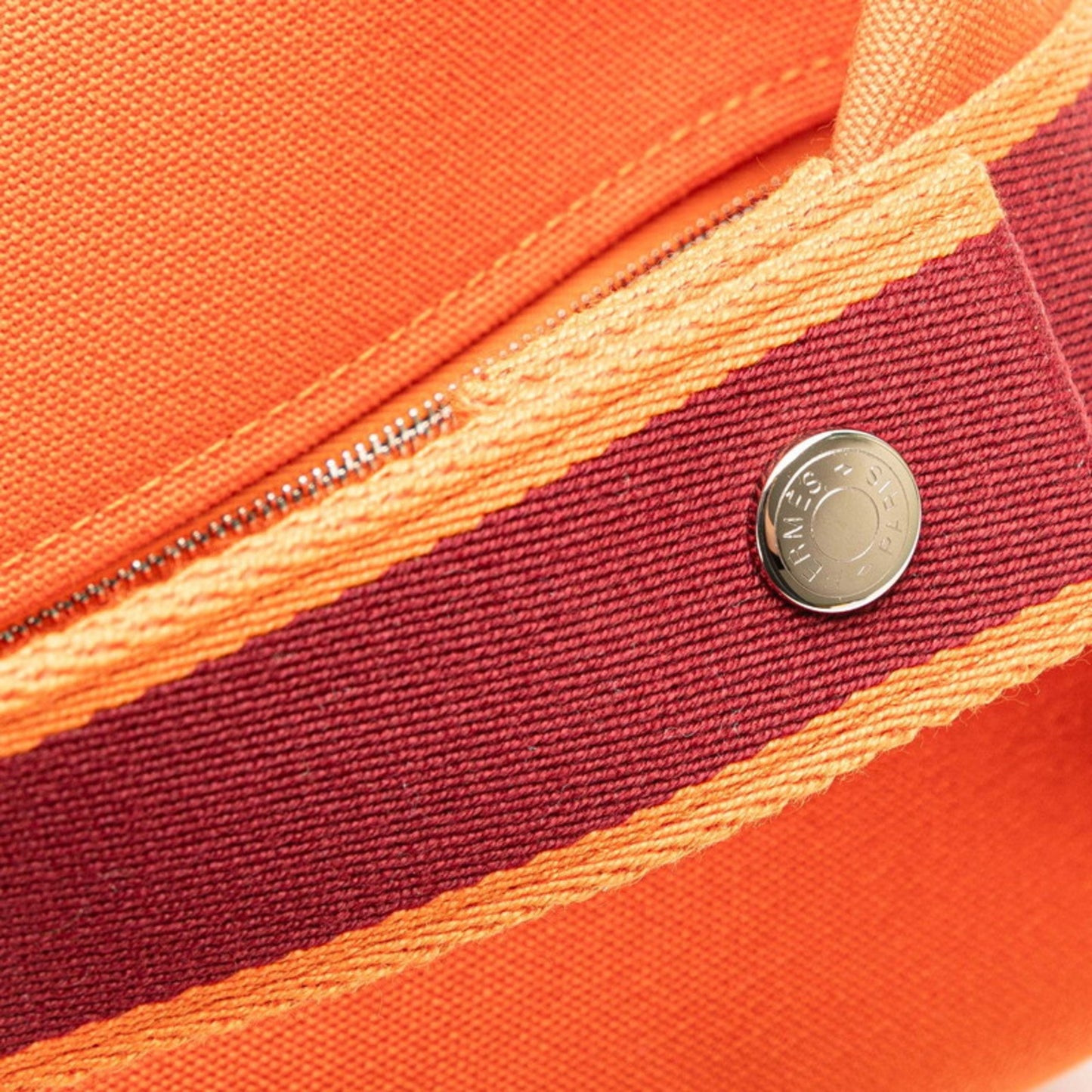 Hermes Herms Bride A Black Gm Handbag In Orange Canvas