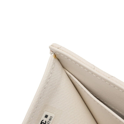 Chanel Matelasse Coco Mark Rhinestone Tri-Fold Wallet In White Caviar Leather