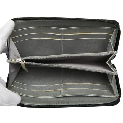 Chanel Coco Mark Camellia Round Zip Long Wallet In Black Lambskin