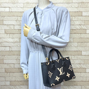 Louis Vuitton On The Go Pm Two-Tone Monogram Empreinte Shoulder Bag