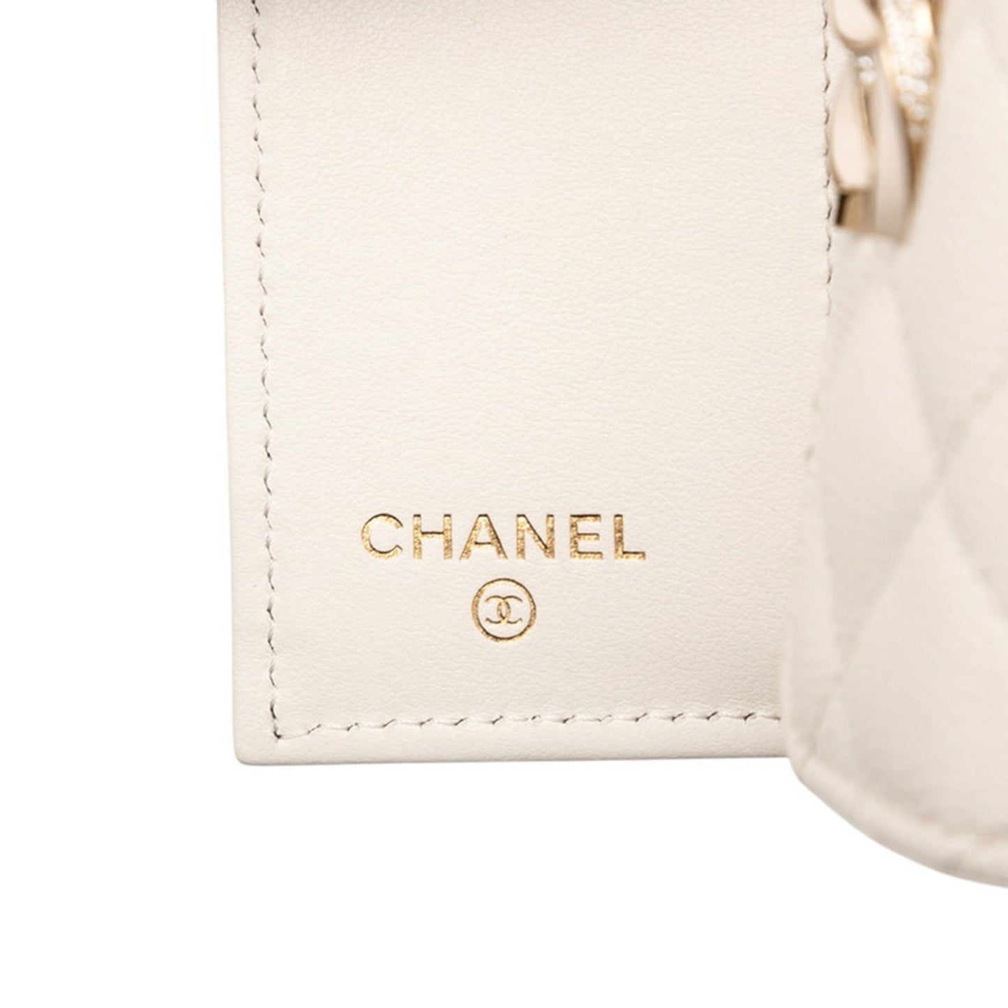 Chanel Matelasse Coco Mark Rhinestone Tri-Fold Wallet In White Caviar Leather